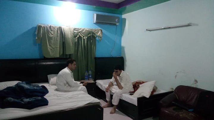 Family room layout with beds and seating
